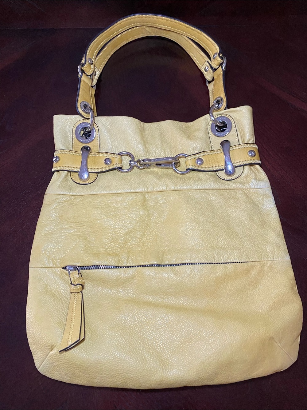 B. Makowsky Hobo pebbled leather bag in soft buttery yellow.